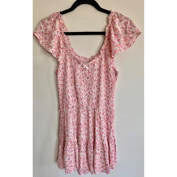Self Esteem Dresses & Skirts - Self Esteem Juniors' Flutter-Sleeve Smocked Ruffle-Hem Romper Pink Floral L